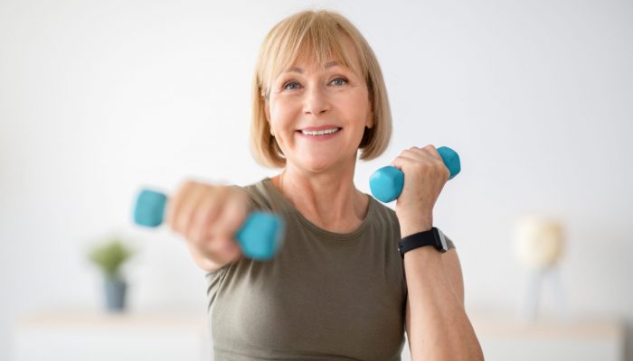 Home,Training,Concept.,Strong,Senior,Woman,Doing,Exercises,With,Dumbbells